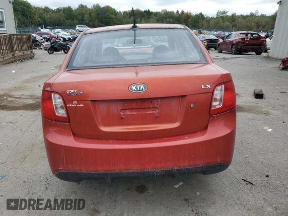 2010 Kia Rio LX with VIN KNADH4A37A6665399, listed as a Copart auction lot 72571284 with 132,610 mi miles and Salvage Title. Bid and sale history available at DreamBid. Image 6.