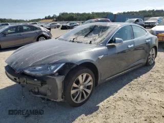 2014 Tesla Model S 60 with VIN 5YJSA1H15EFP49412, listed as a Copart auction lot 60476835 with 96,202 mi miles and Salvage title. Bid and sale history available at DreamBid. Image 1.