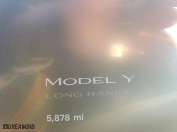 2024 Tesla Model Y with VIN 7SAYGDED1RF154851, listed as a Copart auction lot 87863255 with 5,878 mi miles and Salvage Title. Bid and sale history available at carsss.com. Image 9.