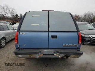 1994 Chevrolet Suburban z VIN 1GNFK16K4RJ348093, wystawiony jako Copart lot #87352784 z przebiegiem 118 442 mil mil oraz Nie do naprawy • Non repairable. Historia ofert i sprzedaży dostępna na DreamBid. Obrazek 6.