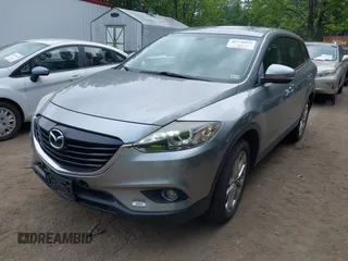 2013 Mazda CX-9 Grand Touring with VIN JM3TB3DV1D0409510, listed as a IAAI auction lot 42578873 with 154,570 mi miles and . Bid and sale history available at DreamBid. Image 2.