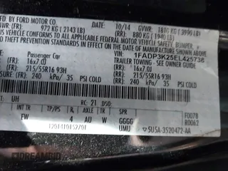 2014 Ford Focus SE with VIN 1FADP3K25EL425738, listed as a IAAI auction lot 42127245 with 161,163 mi miles. Bid and sale history available at carsss.com. Image 9.