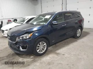 2017 Kia Sorento LX with VIN 5XYPGDA33HG293554, listed as a IAAI auction lot 41764803 with 114,673 mi miles and . Bid and sale history available at DreamBid. Image 2.