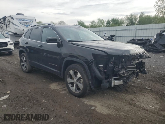 2021 Jeep Cherokee Limited with VIN 1C4PJMDX1MD206064, listed as a Copart auction lot 54877075 with 41,285 mi miles and Salvage title. Bid and sale history available at DreamBid. Image 4.