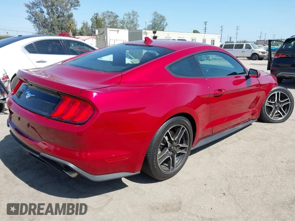 2021 Ford Mustang EcoBoost with VIN 1FA6P8TH7M5125744, listed as a IAAI auction lot 42520877 with 31,953 mi miles and . Bid and sale history available at DreamBid. Image 4.