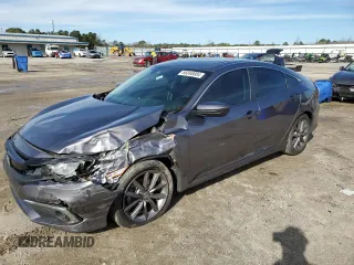 2021 Honda Civic Sedan EX-L with VIN 19XFC1F74ME002424, listed as a Copart auction lot 86898084 with 32,702 mi miles and Salvage Title. Bid and sale history available at carsss.com. Image 1.