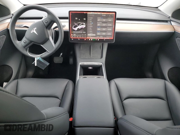 2025 Tesla Model Y Long Range with VIN 7SAYGDED6SF227475, listed as a Copart auction lot 42634345 with 3,493 mi miles and Salvage Title. Bid and sale history available at DreamBid. Image 8.