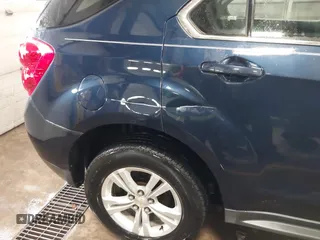 2015 Chevrolet Equinox LS z VIN 2GNFLEEK3F6143783, wystawiony jako IAAI lot #41507583 z przebiegiem 131 463 mil mil oraz . Historia ofert i sprzedaży dostępna na DreamBid. Obrazek 18.