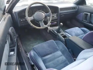 1986 Toyota Supra z VIN JT2MA70L4G0016772, wystawiony jako Copart lot #85806484 z przebiegiem 128 504 mil mil oraz Czysty tytuł • Clean title. Historia ofert i sprzedaży dostępna na DreamBid. Obrazek 8.