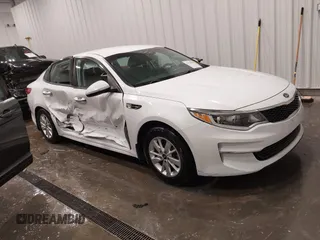 2016 Kia Optima LX with VIN 5XXGT4L38GG048180, listed as a IAAI auction lot 41923650 with 58,018 mi miles. Bid and sale history available at carsss.com. Image 1.