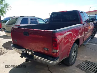 2002 Ford F-150 XL with VIN 1FTRX17W02KB40270, listed as a IAAI auction lot 42573017 with Not provided miles and . Bid and sale history available at DreamBid. Image 4.