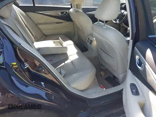 2014 Infiniti Q50 Premium with VIN JN1BV7AR0EM689783, listed as a IAAI auction lot 41661020 with 124,762 mi miles. Bid and sale history available at carsss.com. Image 8.