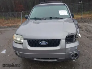 2007 Ford Escape XLT with VIN 1FMYU03177KB90563, listed as a IAAI auction lot 41566335 with 166,233 mi miles. Bid and sale history available at carsss.com. Image 12.