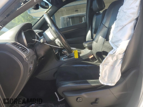 2017 Jeep Grand Cherokee Altitude with VIN 1C4RJFAG4HC919335, listed as a Copart auction lot 56529825 with 187,194 mi miles and Salvage title. Bid and sale history available at DreamBid. Image 7.