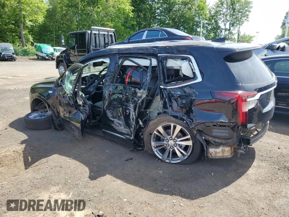 2025 Cadillac XT6 AWD Premium Luxury z VIN 1GYKPDRS9SZ120694, wystawiony jako Copart lot #57130005 z przebiegiem Nie podano mil oraz Szkody całkowita. Historia ofert i sprzedaży dostępna na DreamBid. Obrazek 2.