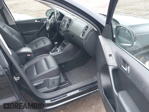 2016 Volkswagen Tiguan S with VIN WVGBV7AXXGW581315, listed as a IAAI auction lot 41495812 with 180,061 mi miles and . Bid and sale history available at DreamBid. Image 5.