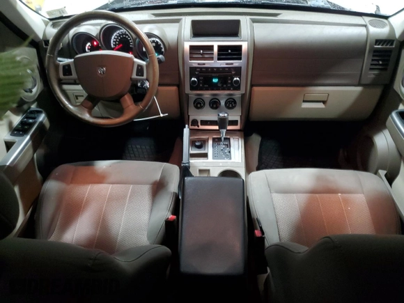 2010 Dodge Nitro SXT with VIN 1D4PU5GK2AW129723, listed as a Copart auction lot 47230535 with 228,701 mi miles and Salvage Title. Bid and sale history available at DreamBid. Image 8.