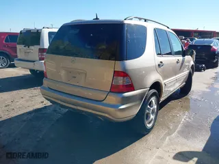 2003 Mercedes-Benz M-Class 3.7L with VIN 4JGAB57E33A414218, listed as a IAAI auction lot 41057534 with 132,342 mi miles. Bid and sale history available at carsss.com. Image 4.