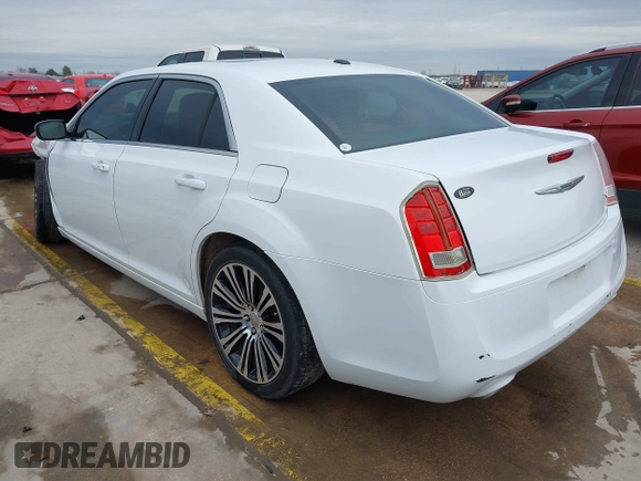 2013 Chrysler 300 with VIN 2C3CCABGXDH735739, listed as a IAAI auction lot 41282492 with 121,487 mi miles. Bid and sale history available at carsss.com. Image 3.