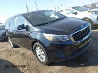 2016 Kia Sedona L with VIN KNDMA5C12G6149520, listed as a IAAI auction lot 41769798 with 216,629 mi miles. Bid and sale history available at carsss.com. Image 1.
