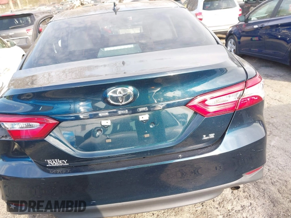 2019 Toyota Camry LE z VIN 4T1B11HK0KU759885, wystawiony jako IAAI lot #41684709 z przebiegiem 80 417 mil mil oraz . Historia ofert i sprzedaży dostępna na DreamBid. Obrazek 16.