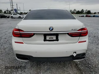 2016 BMW 7 Series 740i with VIN WBA7E2C52GG547112, listed as a Copart auction lot 63069355 with 76,867 mi miles and Salvage title. Bid and sale history available at DreamBid. Image 6.