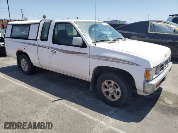 1997 Nissan Frontier XE with VIN 1N6SD16S3VC427137, listed as a Copart auction lot 57911575 with 228,542 mi miles and Clean title. Bid and sale history available at DreamBid. Image 4.