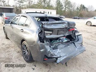 2019 BMW 3 Series 330i xDrive with VIN WBA5R7C53KAJ84615, listed as a IAAI auction lot 41774006 with Not provided miles and . Bid and sale history available at DreamBid. Image 6.
