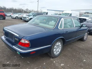 1998 Jaguar XJ with VIN SAJHX124XWC844575, listed as a IAAI auction lot 41951600 with 97,458 mi miles. Bid and sale history available at carsss.com. Image 4.