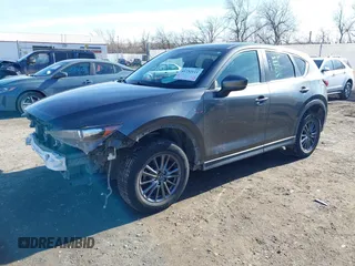2019 Mazda CX-5 Touring with VIN JM3KFBCM7K0611896, listed as a IAAI auction lot 41732111 with 90,826 mi miles. Bid and sale history available at carsss.com. Image 2.