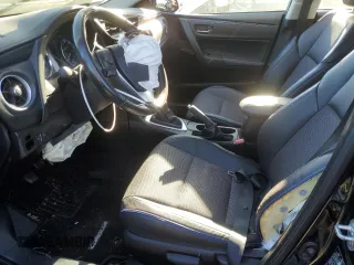 2019 Toyota Corolla L z VIN 2T1BURHE1KC198906, wystawiony jako Copart lot #87813125 z przebiegiem Nie podano mil oraz Nie do naprawy • Non repairable. Historia ofert i sprzedaży dostępna na DreamBid. Obrazek 7.