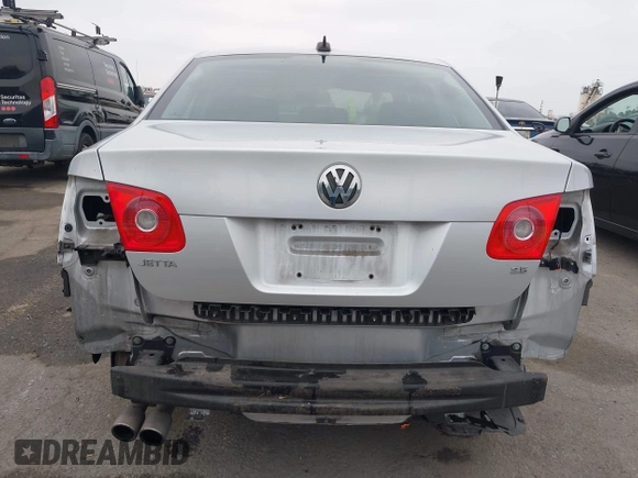 2005 Volkswagen Jetta z VIN 3VWDG71K85M603060, wystawiony jako IAAI lot #42106030 z przebiegiem 152 666 mil mil oraz . Historia ofert i sprzedaży dostępna na DreamBid. Obrazek 6.