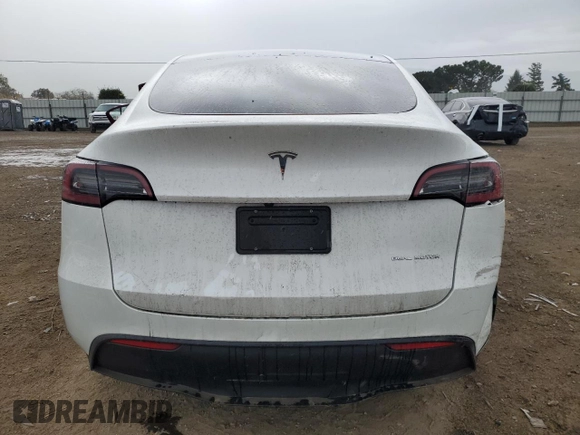 2024 Tesla Model Y Long Range z VIN 7SAYGDEE5RF075756, wystawiony jako Copart lot #48819465 z przebiegiem 10 457 mil mil oraz Szkoda całkowita • Salvage title. Historia ofert i sprzedaży dostępna na DreamBid. Obrazek 6.