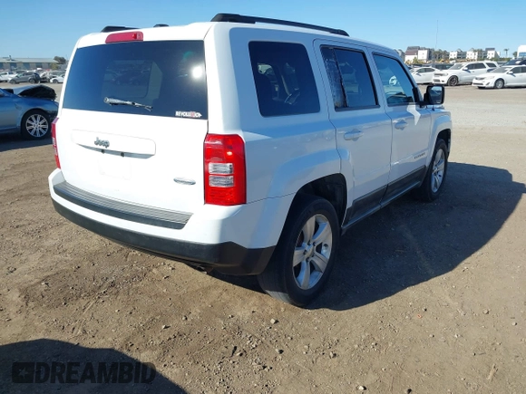 2011 Jeep Patriot Latitude with VIN 1J4NT1GB0BD105816, listed as a IAAI auction lot 41330180 with 143,431 mi miles. Bid and sale history available at carsss.com. Image 4.