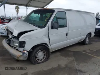 2001 Ford Econoline Cargo with VIN 1FTRE14211HA57966, listed as a IAAI auction lot 42207750 with 239,936 mi miles and . Bid and sale history available at DreamBid. Image 2.
