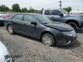 2010 Ford Fusion Hybrid с VIN 3FADP0L34AR129353, выставлен на аукционе Copart как лот 58310725 с пробегом 237 662 миль миль и Списание • Salvage title. История ставок и продаж доступна на DreamBid. Изображение 4.