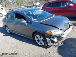 2010 Honda Civic Sdn LX-S with VIN 2HGFA1F68AH517604, listed as a IAAI auction lot 40940010 with 118,420 mi miles. Bid and sale history available at carsss.com. Image 1.