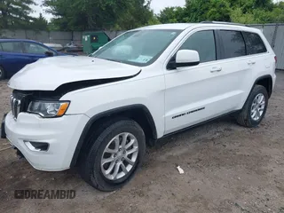 2021 Jeep Grand Cherokee Laredo E with VIN 1C4RJFAG7MC620710, listed as a IAAI auction lot 42255694 with 51,989 mi miles and . Bid and sale history available at DreamBid. Image 18.