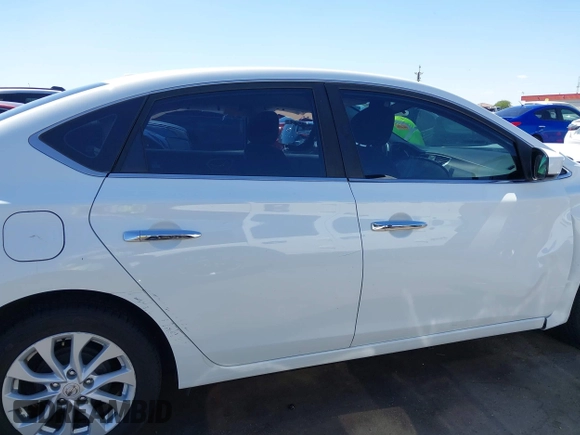 2019 Nissan Sentra S with VIN 3N1AB7AP8KY323629, listed as a IAAI auction lot 42207129 with 77,265 mi miles and . Bid and sale history available at DreamBid. Image 14.