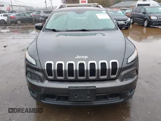 2014 Jeep Cherokee Latitude z VIN 1C4PJMCS5EW137875, wystawiony jako IAAI lot #41475923 z przebiegiem 124 565 mil mil oraz . Historia ofert i sprzedaży dostępna na DreamBid. Obrazek 12.