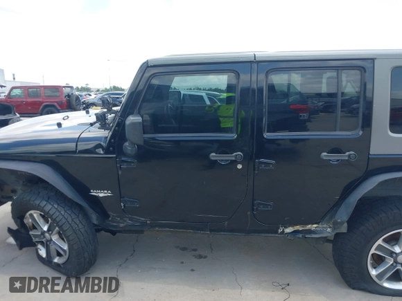 2008 Jeep Wrangler Unlimited Sahara with VIN 1J4GB59198L619802, listed as a IAAI auction lot 42361793 with 272,295 mi miles and . Bid and sale history available at DreamBid. Image 15.