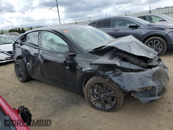 2021 Tesla Model Y Long Range z VIN 5YJYGDEE7MF093942, wystawiony jako Copart lot #54762425 z przebiegiem 20 492 mil mil oraz Szkoda całkowita • Salvage title. Historia ofert i sprzedaży dostępna na DreamBid. Obrazek 4.