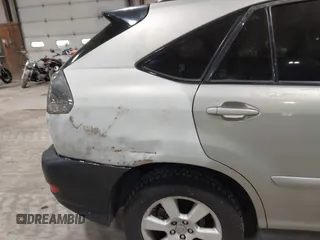 2004 Lexus RX 330 z VIN JTJHA31U640018394, wystawiony jako IAAI lot #42287633 z przebiegiem 200 999 mil mil oraz . Historia ofert i sprzedaży dostępna na DreamBid. Obrazek 13.
