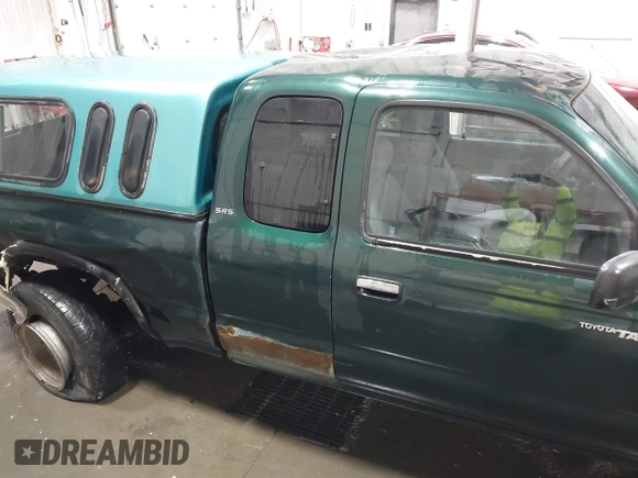 2000 Toyota Tacoma with VIN 5TEWN72N8YZ708960, listed as a IAAI auction lot 41820405 with 175,453 mi miles and . Bid and sale history available at DreamBid. Image 6.