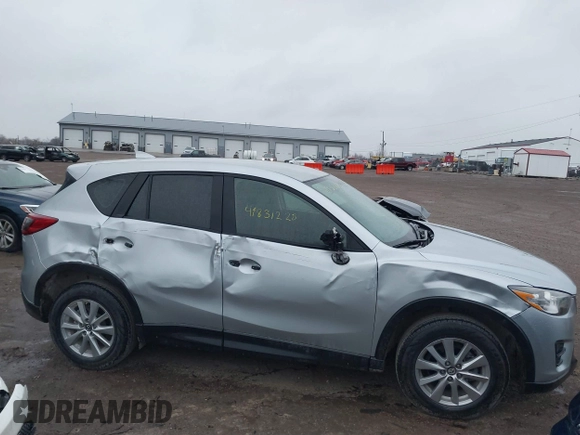 2016 Mazda CX-5 Sport with VIN JM3KE2BY5G0647715, listed as a IAAI auction lot 41831228 with 89,689 mi miles and . Bid and sale history available at DreamBid. Image 6.