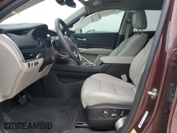 2023 Cadillac XT4 FWD Premium Luxury with VIN 1GYFZCR48PF100078, listed as a Copart auction lot 55955865 with 23,509 mi miles and Salvage title. Bid and sale history available at DreamBid. Image 7.