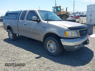 2001 Ford F-150 XL z VIN 2FTRX18L61CA78784, wystawiony jako IAAI lot #42228289 z przebiegiem 208 507 mil mil oraz . Historia ofert i sprzedaży dostępna na DreamBid. Obrazek 1.