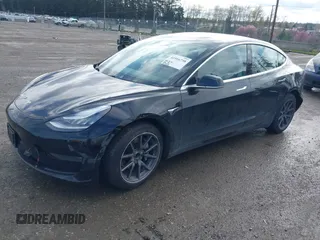 2019 Tesla Model 3 Mid Range with VIN 5YJ3E1EA4KF305611, listed as a IAAI auction lot 41916738 with 59,101 mi miles and . Bid and sale history available at carsss.com. Image 20.