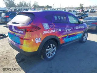 2019 Hyundai Tucson Value with VIN KM8J33A43KU067973, listed as a IAAI auction lot 40122626 with 107,358 mi miles. Bid and sale history available at carsss.com. Image 4.