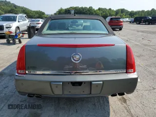 2007 Cadillac DTS V8 z VIN 1G6KD57Y67U136984, wystawiony jako Copart lot #65570084 z przebiegiem 114 814 mil mil oraz Szkoda całkowita • Salvage title. Historia ofert i sprzedaży dostępna na DreamBid. Obrazek 6.